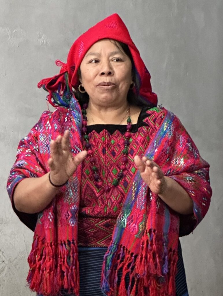 Guatemalan artisan wearing a traditional headdress
